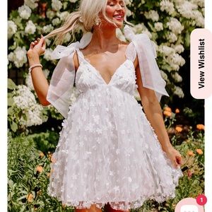 White flowy dress with flowers
